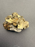 Large NZ pyrite cluster with bright metallic cubic crystals on host rock base