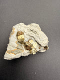 Pyrite crystals on natural host rock matrix, New Zealand specimen