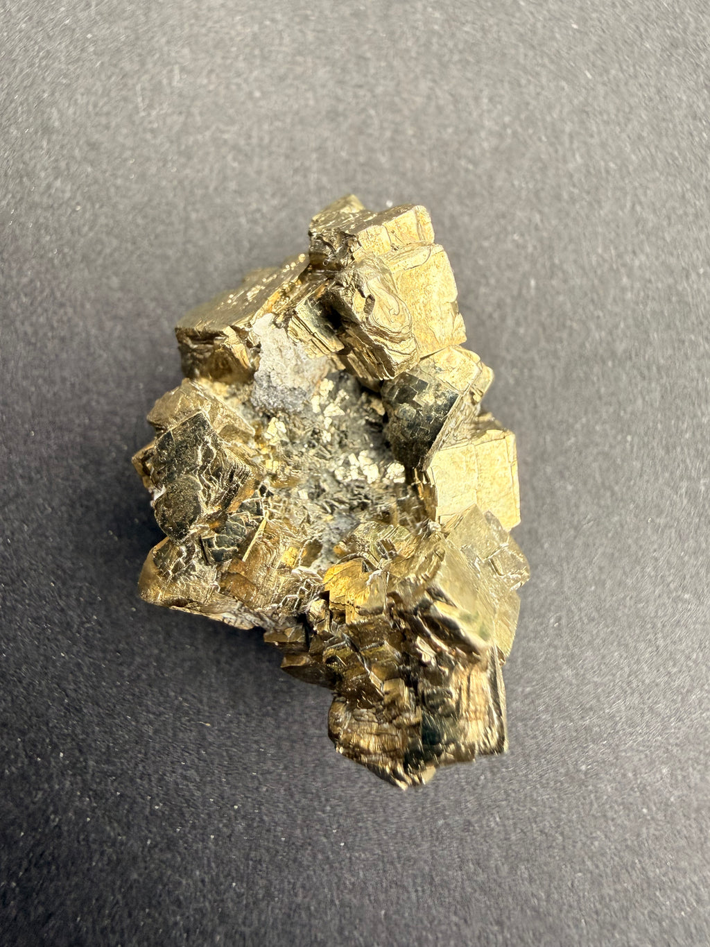 Small pyrite cluster close-up of cubic crystal formation