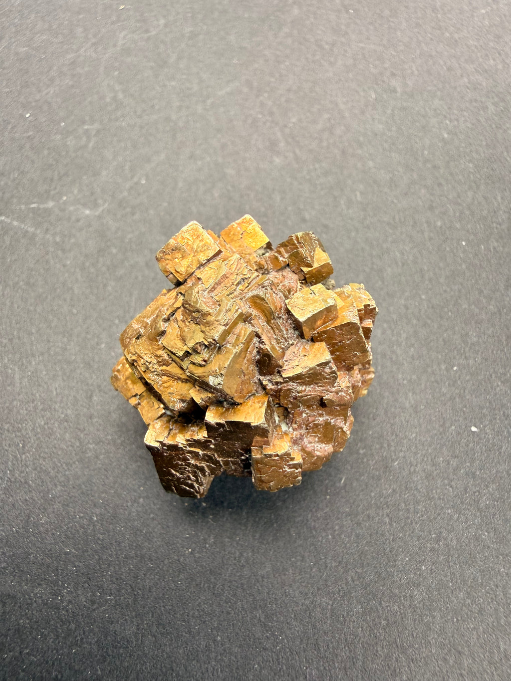 Close-up of oxidised pyrite cubic crystal faces showing natural coastal patina