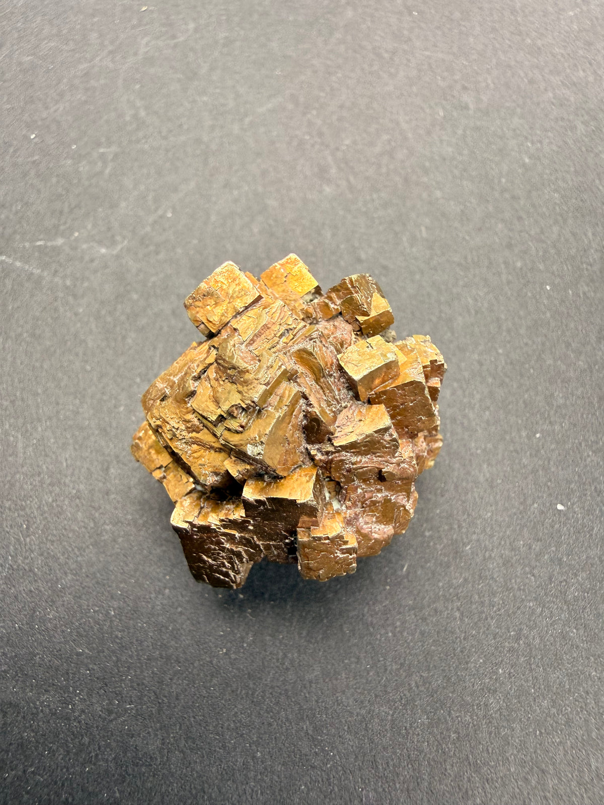 Close-up of oxidised pyrite cubic crystal faces showing natural coastal patina