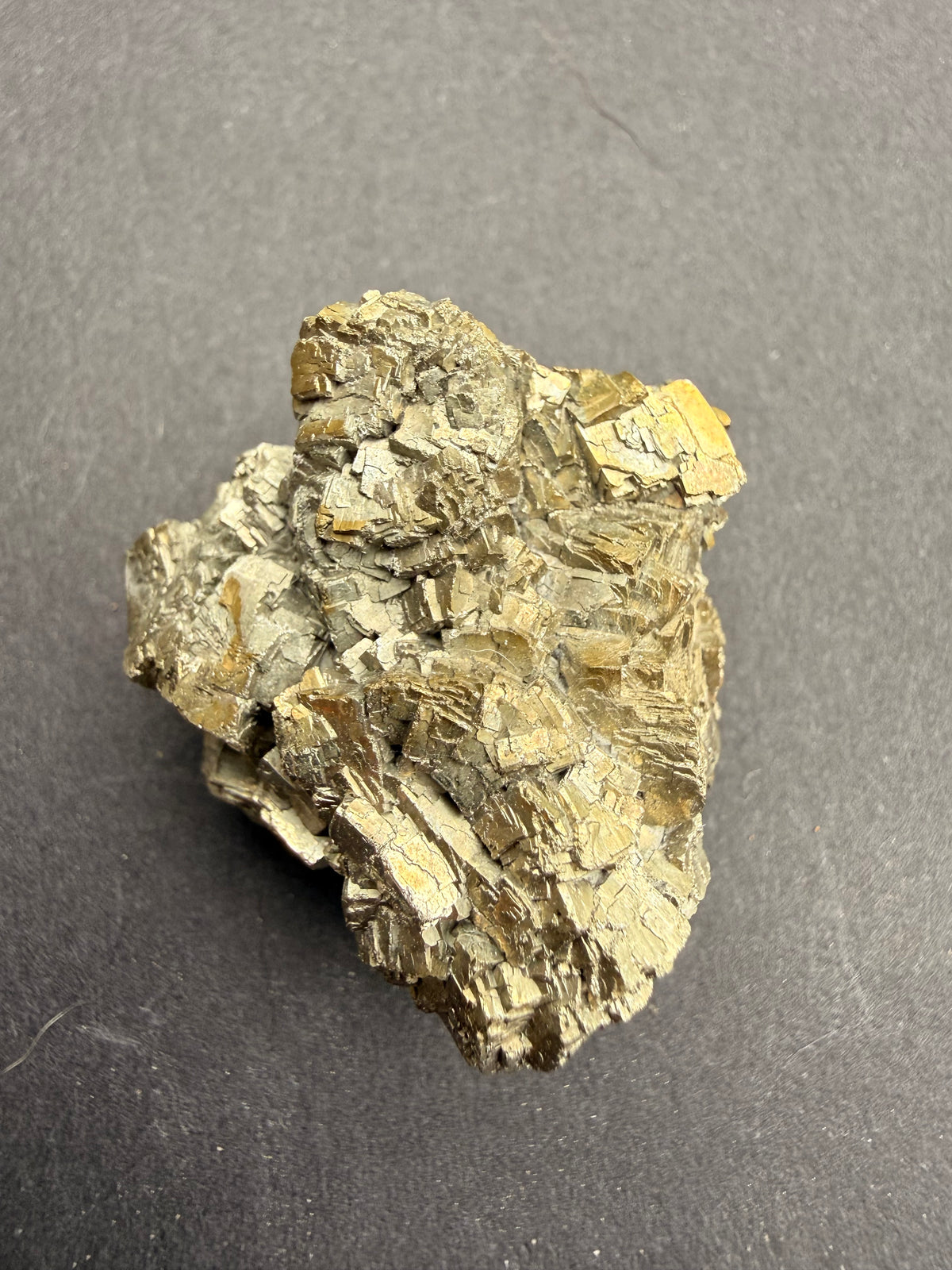 Two-tone pyrite cluster close-up showing silver crystal faces