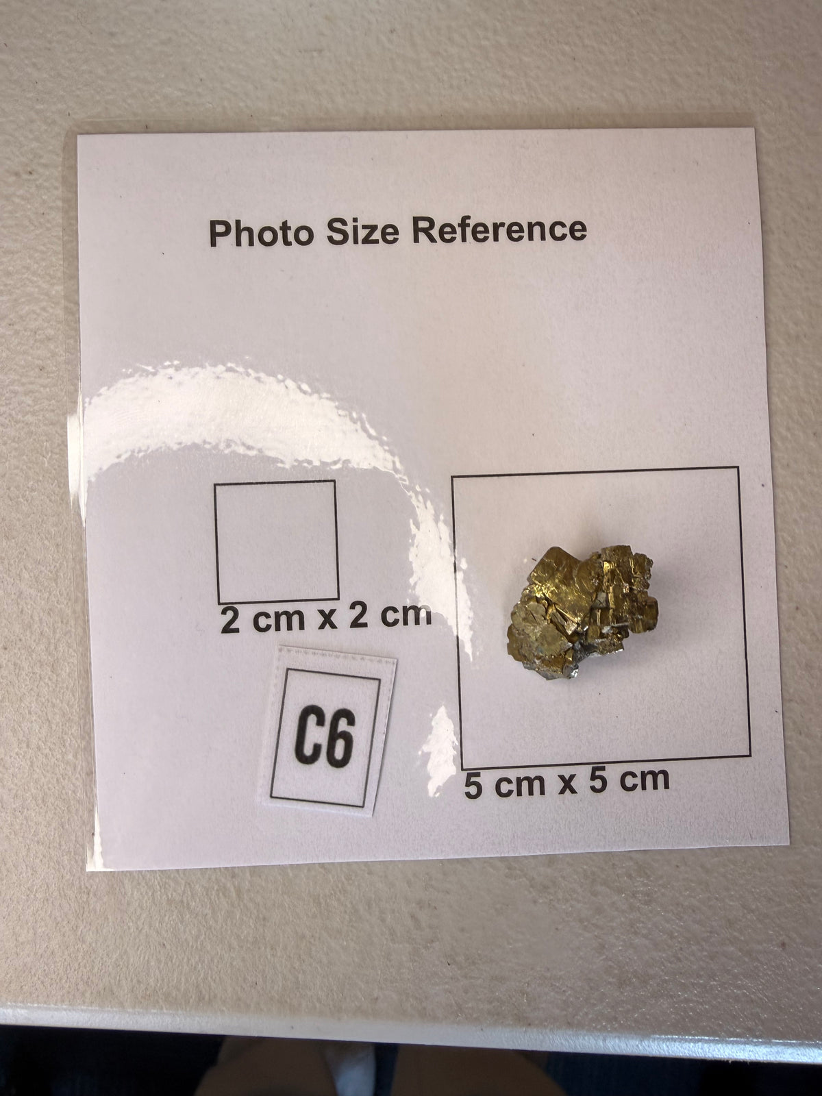Iridescent pyrite cluster, close detail of shifting colour on cubic faces
